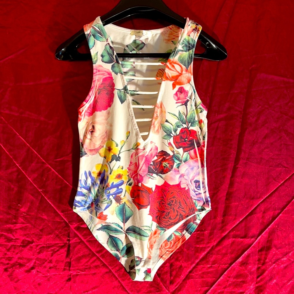 Sage Floral sleeveless bodysuit.
